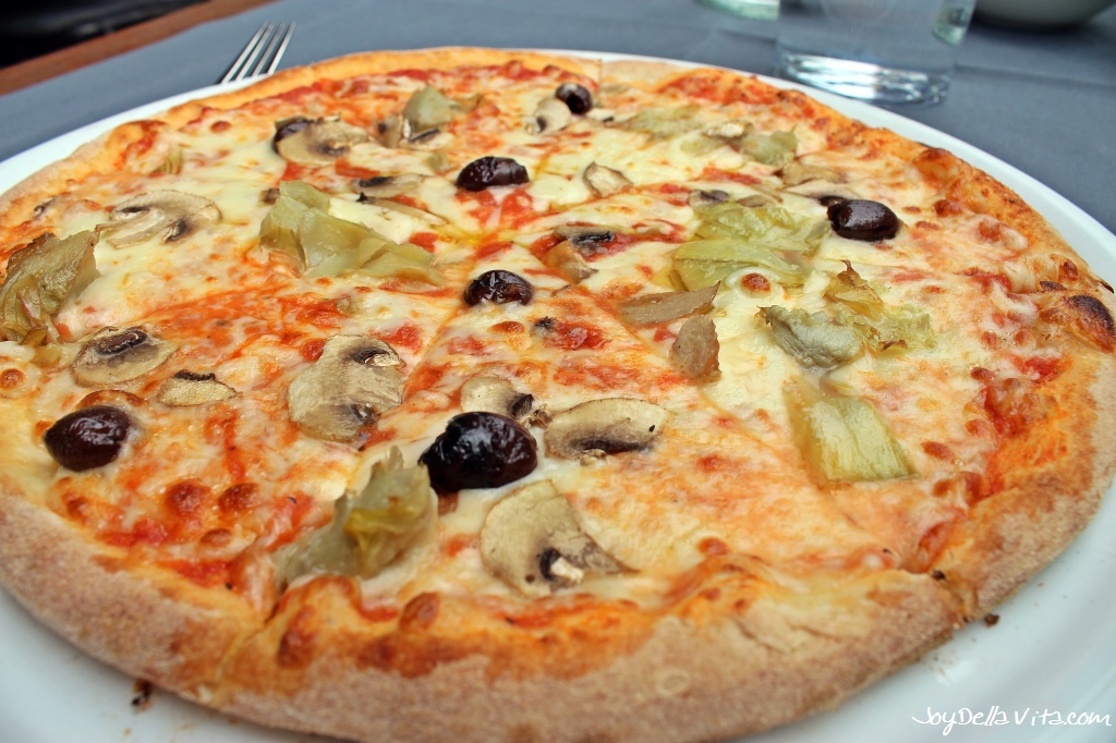 PIZZA FOUR SEASONS with Tomato, mozzarella, olives, artichokes, mushrooms Maio Restaurant la Rinascente Milano JoyDellaVita 