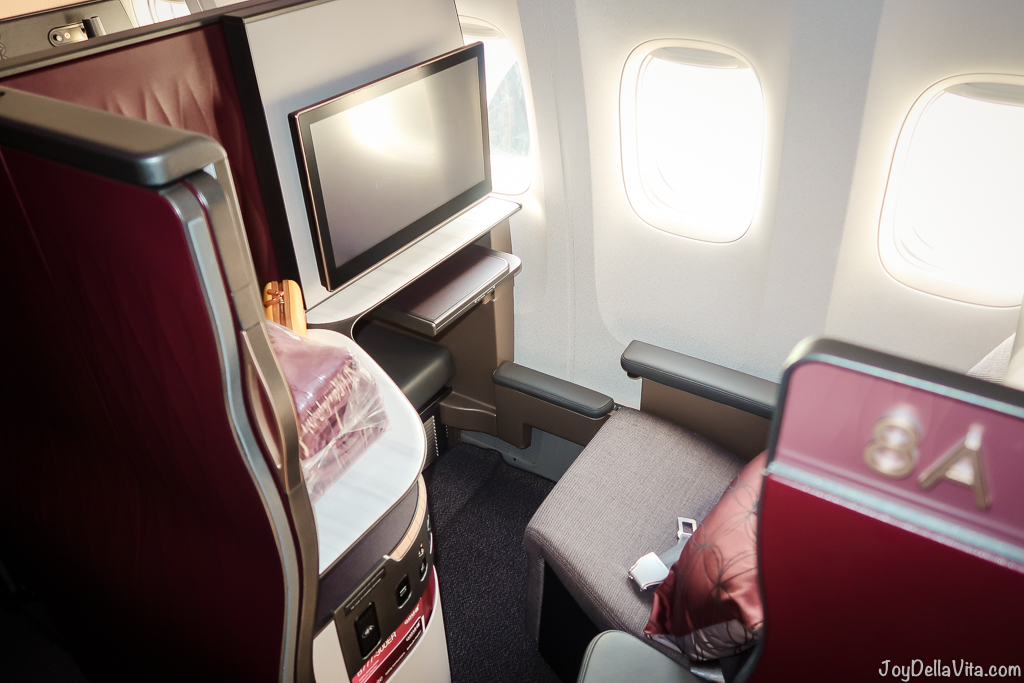 Experience Qatar Airways Qsuite Business Class Flight Window Seat 8A rear facing