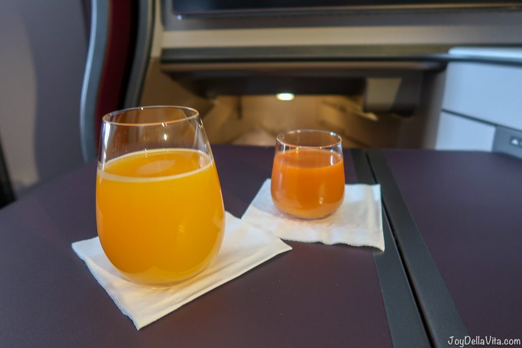 Fresh Orange Juice and Energizer Shot with ginger Qatar Airways Qsuite Business Class