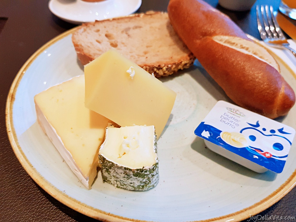 Breakfast at b smart hotel with a selection of local cheese
