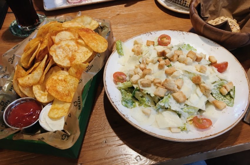 Crispy chips and caesar salad at QMUH in Ravensburg, Oberschwaben, Germany