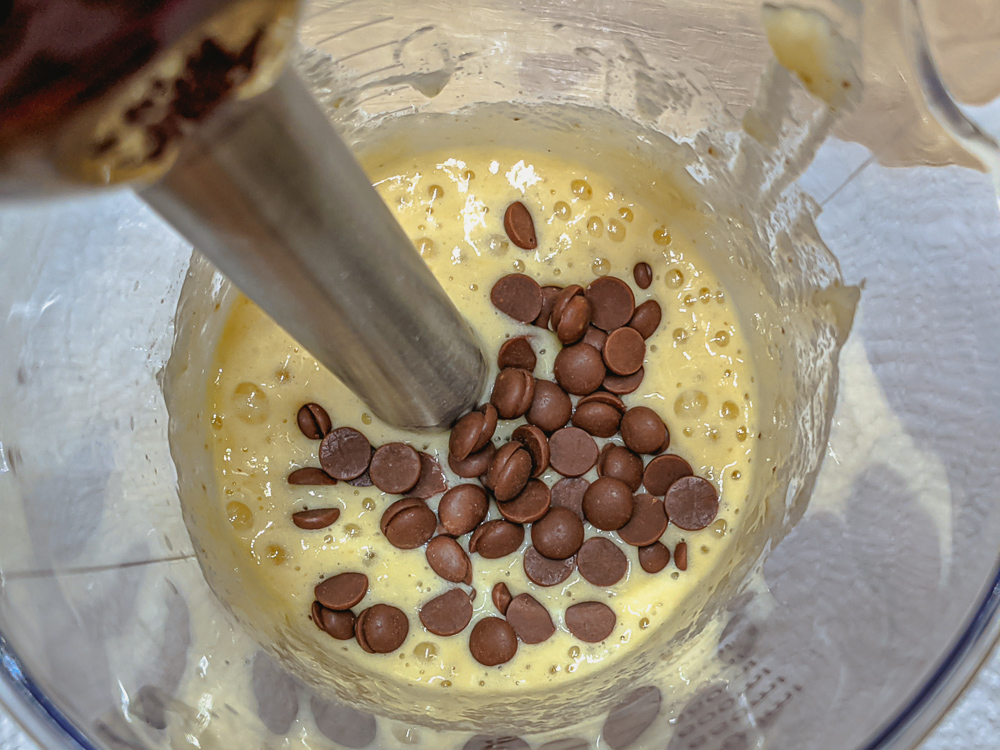 mixing up the chocolate chip banana pancake batter