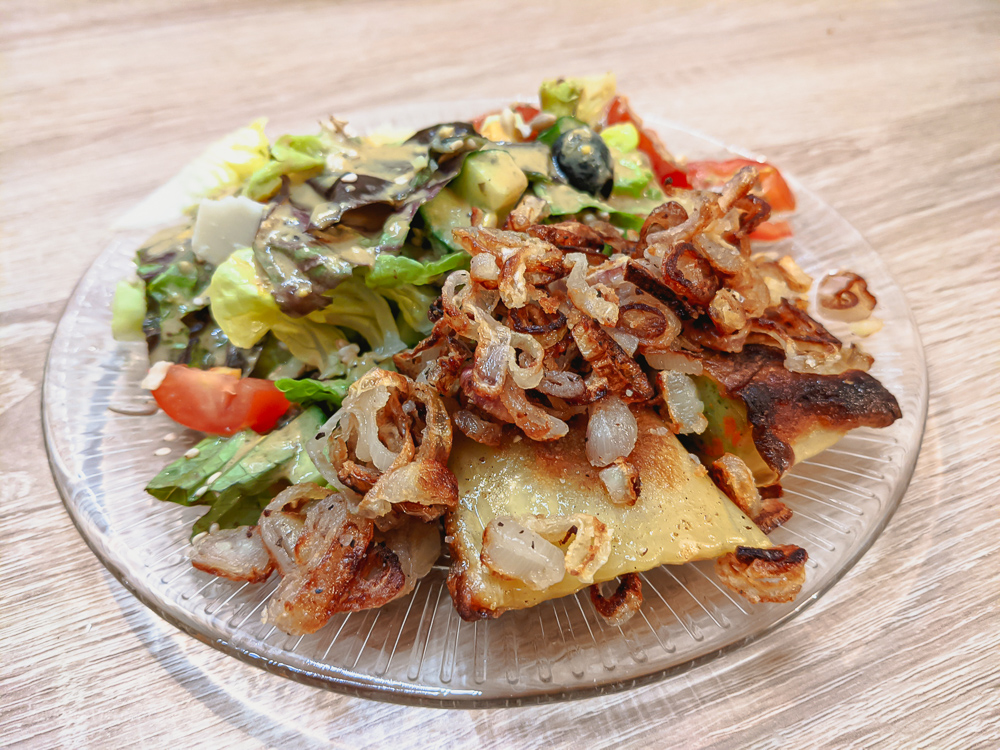 german Maultaschen with fried onions and Salad / potato salad – Recipe
